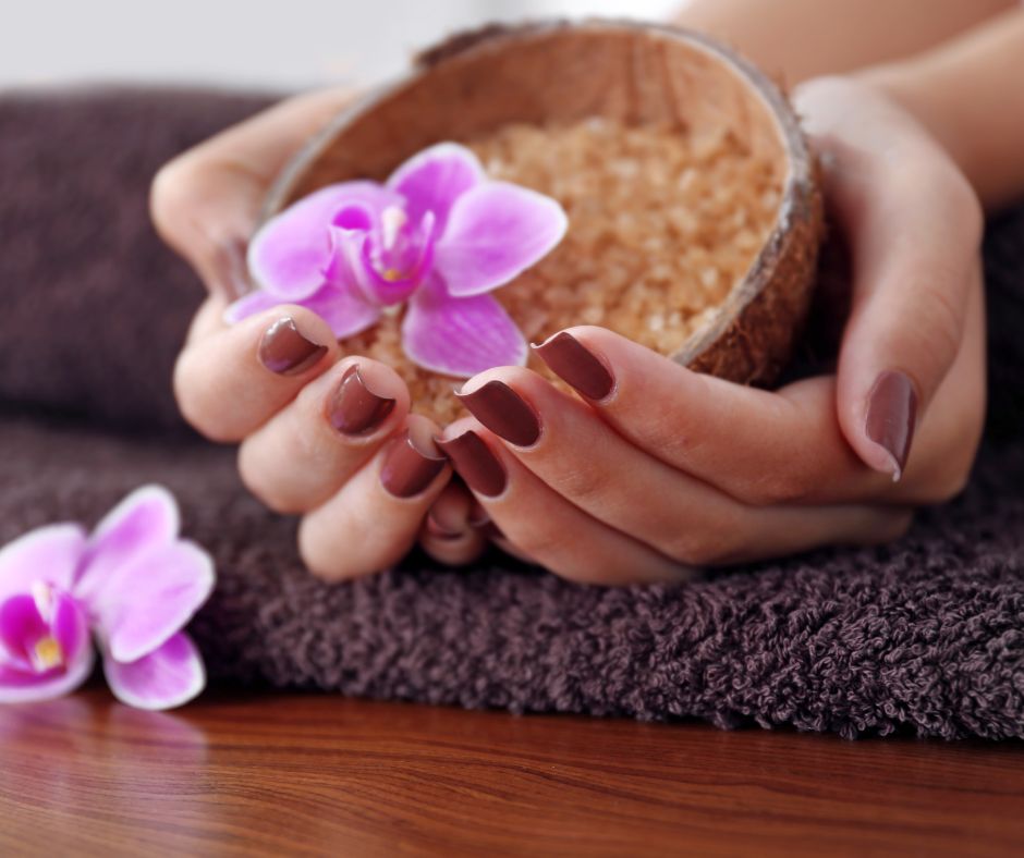 womans hands holding and object